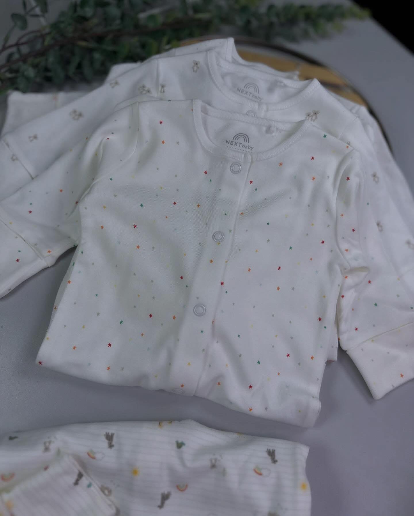 White Bright Character Baby Sleepsuits – 4 Pack - Image 3